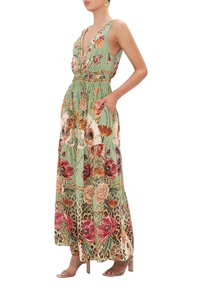 Luxury long occasion dress with deep v-neckline, hand embellished crystals and soft green based leopard print patterns
